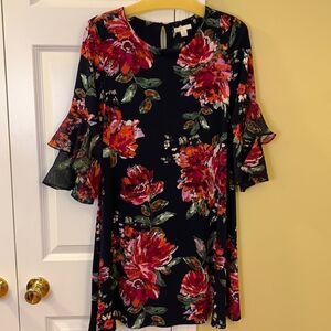 Cato size extra small black floral we need to rest with bell/ruffle sleeves